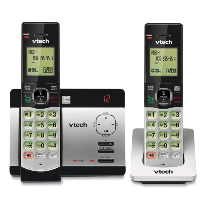 Vtech CS5129-2 Cordless Phone System (Silver/Black) – A simple, cordless phone for the home or office with two handsets. Includes Caller ID, Call Waiting, and a speakerphone for clear two-way talking. Easy to set up with voice guides in English, French, or Spanish. The backlit keypad and screen make it easy to use, even in dim light. Stores up to 30 missed calls and 50 contacts. Add up to five handsets for more coverage. Quiet Mode silences ringers, and the base lights up when you have voicemail. Includes a digital answering system for missed calls. No cords, no hassle.
