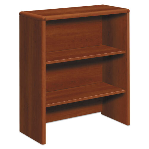 HON 10700 Series Bookcase Hutch combines a durable storage component with a stylish design. The finish is a high-grade laminate that resists staining and abrasions, finished with a stunning hardwood trim for an upscale feel. The rounded edges and waterfall edge provide a contemporary appearance. Two adjustable shelves on the bookcase can be adjusted in 1 1/4-inch increments to meet your requirements. An easy-to-use cord management grommet is found at the rear bottom for convenient cable organization. Its measurements are 32.63 inches wide, 14.63 inches deep, and 37.13 inches tall, and its warm Cognac color makes it an ideal piece of furniture for any office or workplace.