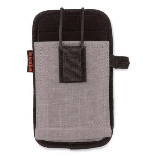 Ergodyne Squids 5544 Holster (Model EGO19187) is a secure, easy-to-use holder for small devices like handle-free barcode scanners, phones, or mobile computers. It keeps your gear safe from drops with a strong elastic strap, hook-and-loop closure, and snug elastic sides to keep items in place. You can attach it to belts, harnesses, or waistbands using either the metal clip for quick removal or the vertical/horizontal loops for a more secure fit. It is tough and ripstop polyester that lasts in rough conditions. The gray holster measures 3.75 x 1.25 x 6.5 inches and fits devices up to 3.5 x 1.5 inches. Perfect for keeping your tools handy and protected while working.